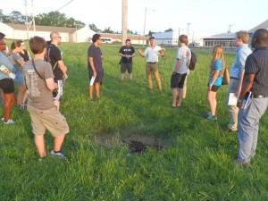 Students consider brownfield sites for re - use as green space and green infrastructure projects. Credit: Clean Air Council