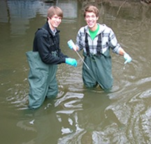 Students conduct water quality monitoring on Plaster Creek