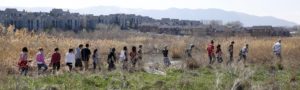 Jordan High School students enter Sandy, Utah, restoration site during CDEA 
